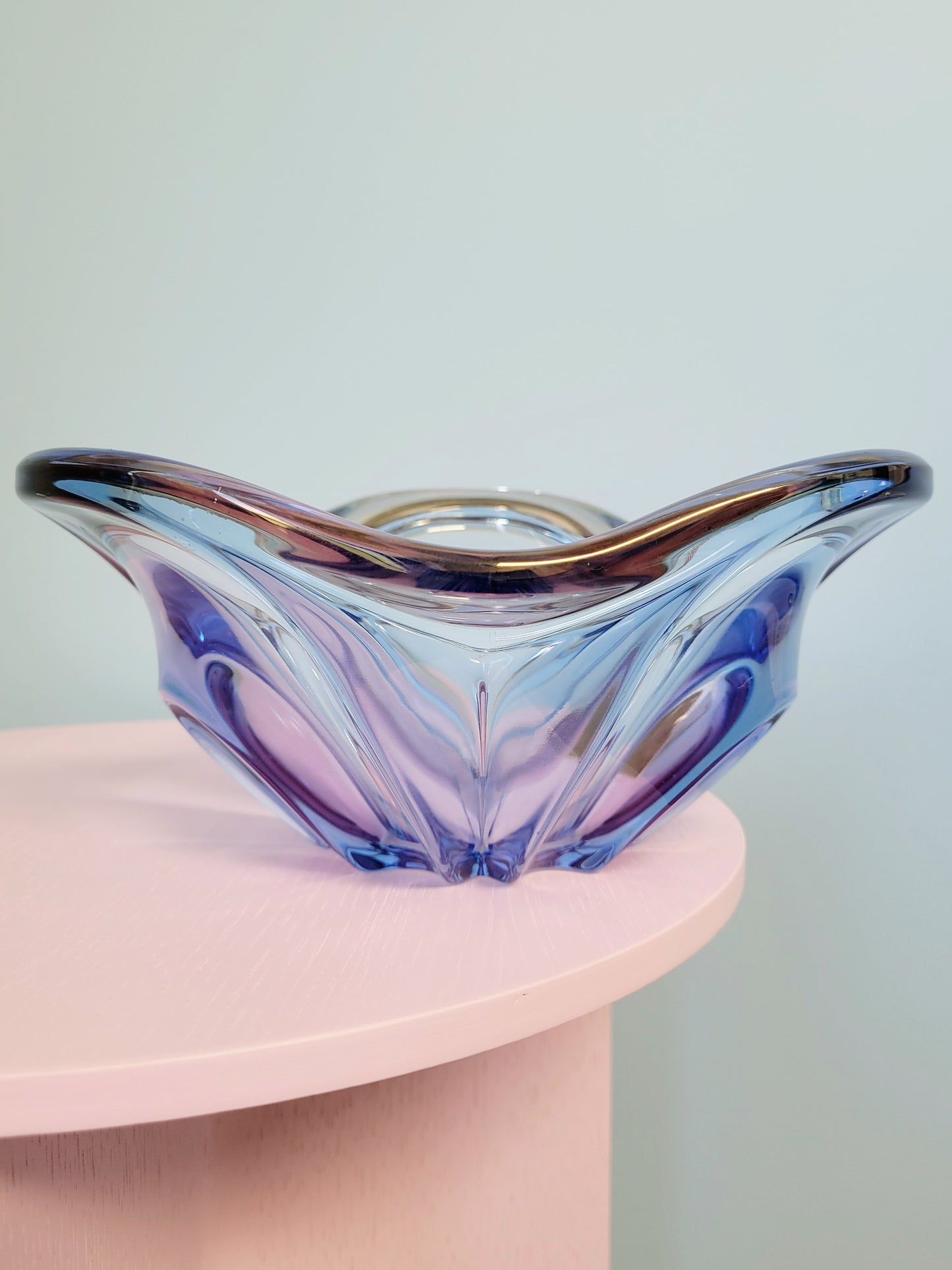 front view of a unique blue and pink glass bowl