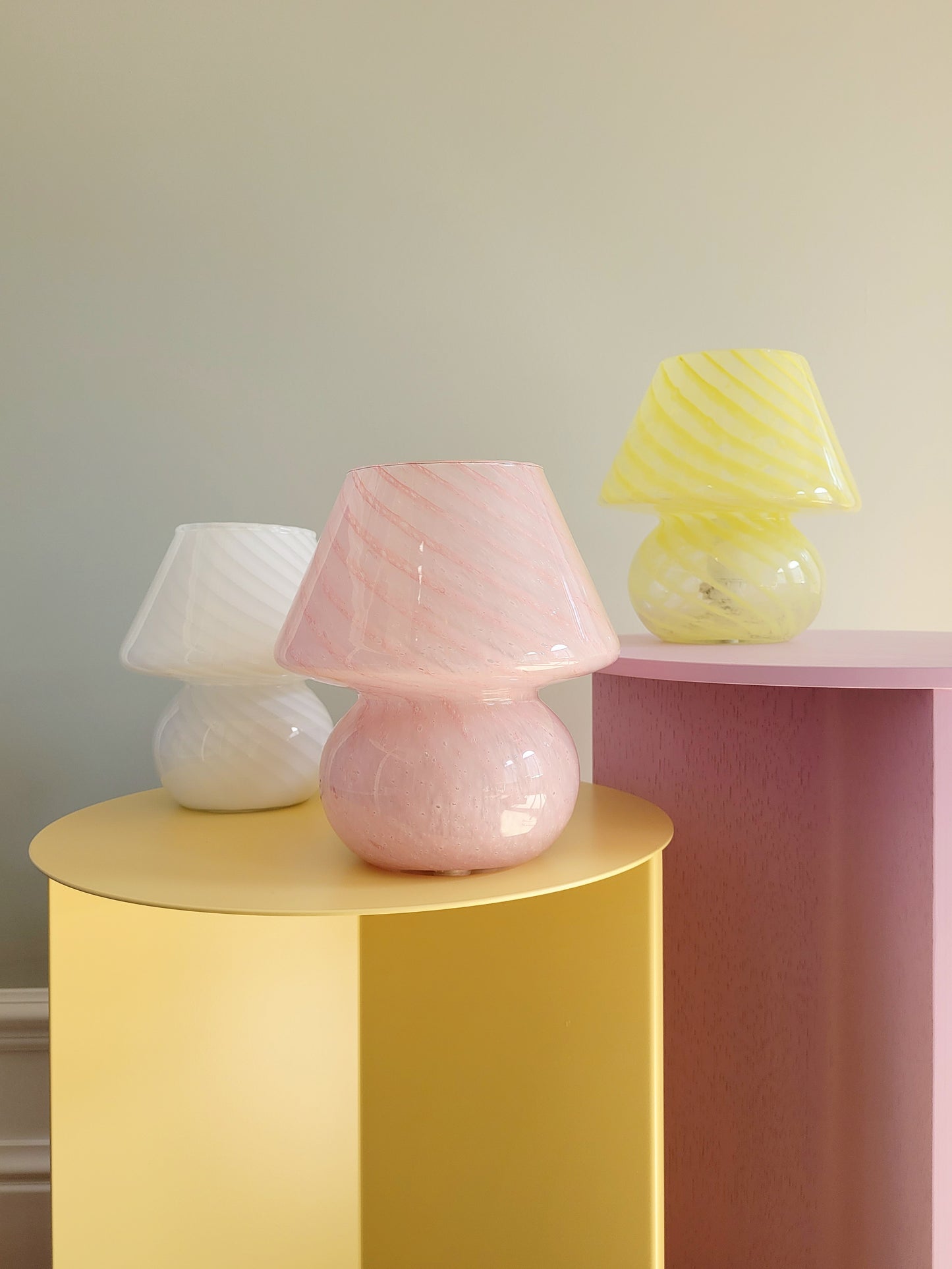 full view of a trio of small colourful vintage Murano mushroom table lamps with yellow pink and white swirls