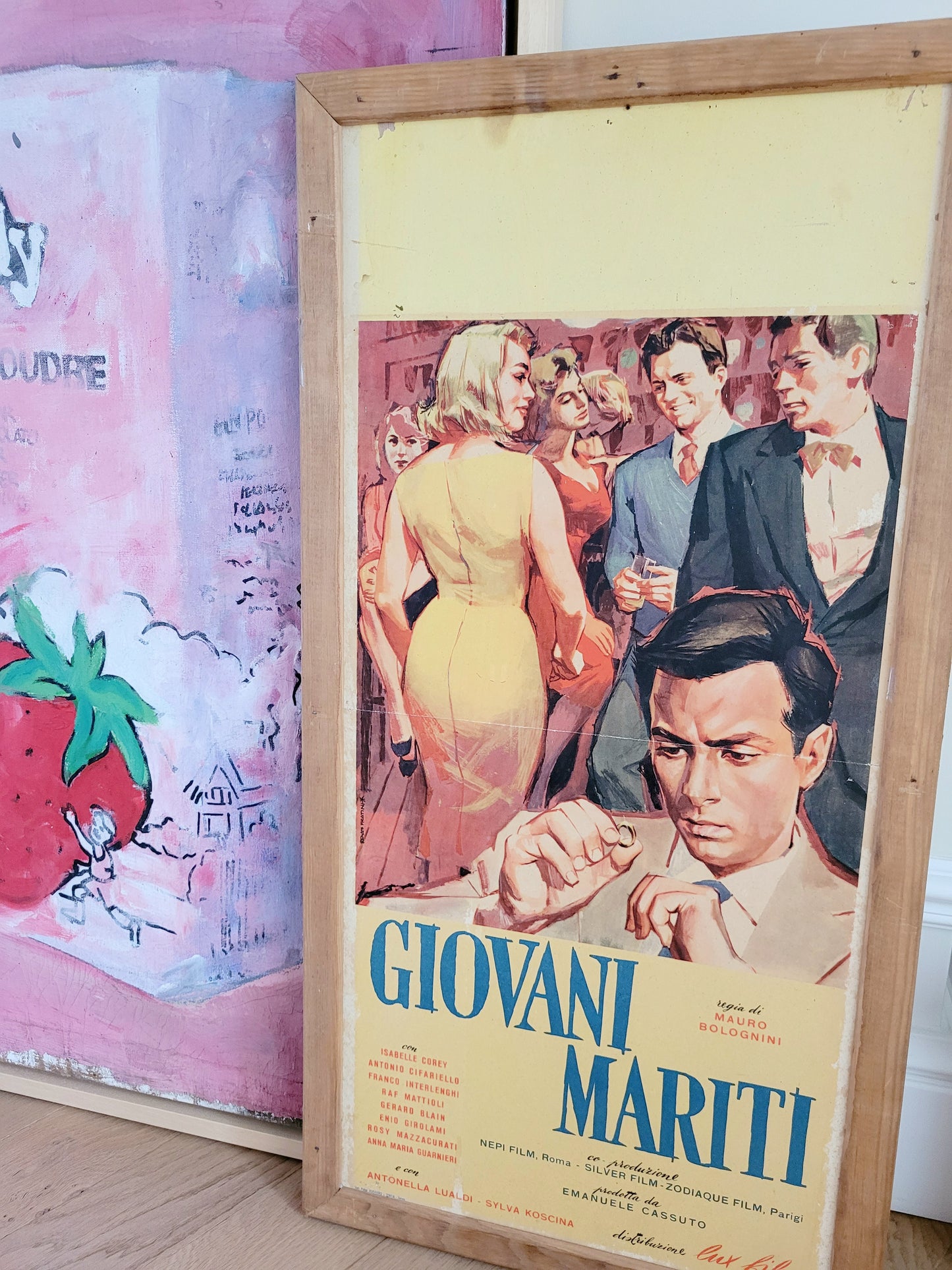 side view of an Italian movie poster of "Giovani Mariti Young Husbands from the golden age of Italian cinema