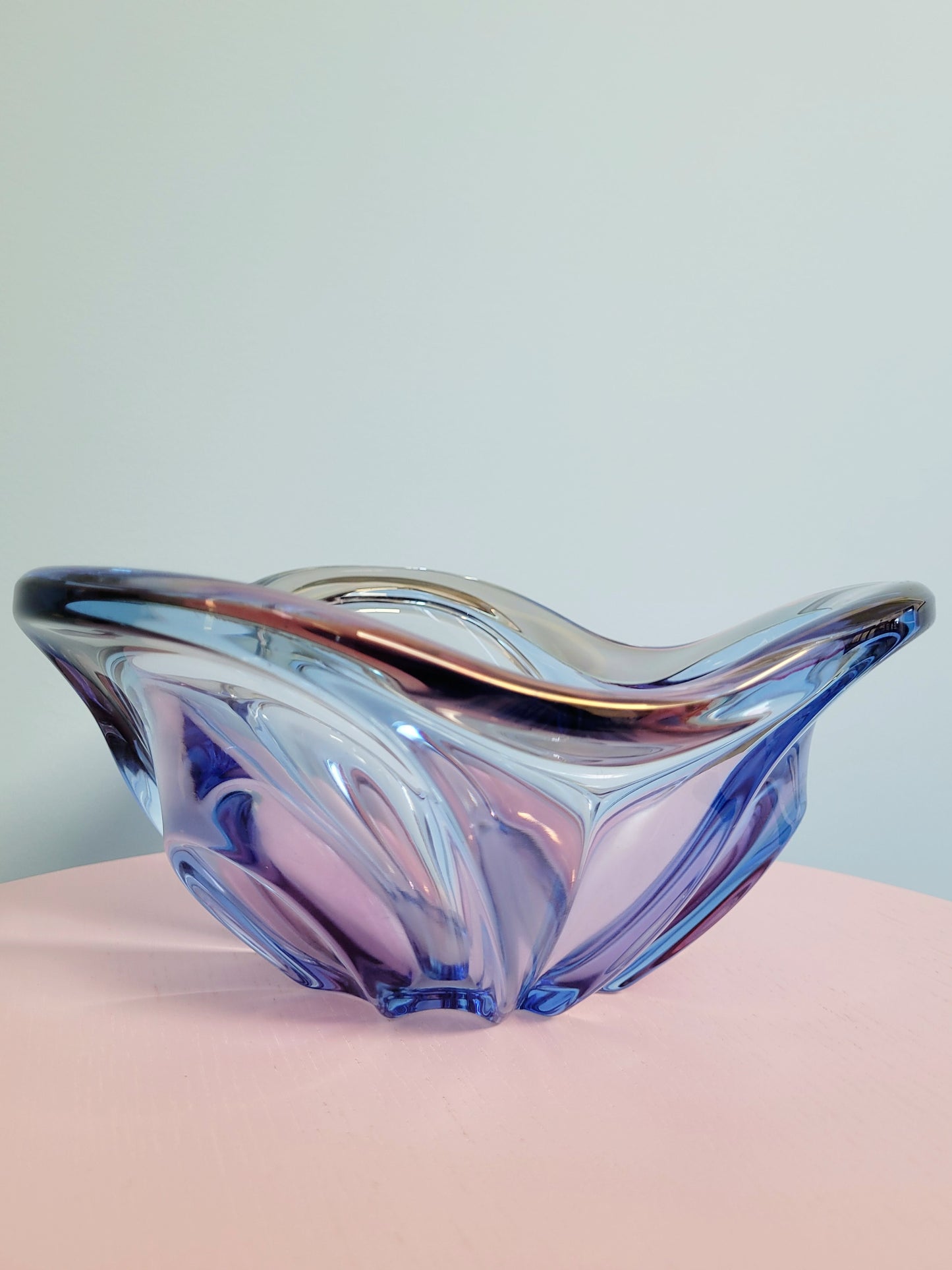 front view of a unique blue and pink glass bowl