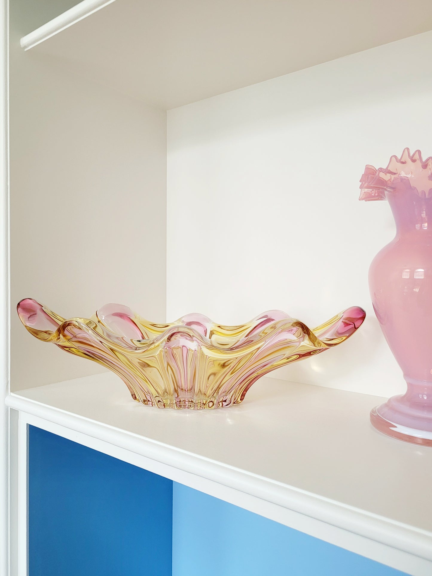 full view of a vibrant candy coloured glass serving or trinket bowl in yellow and pink