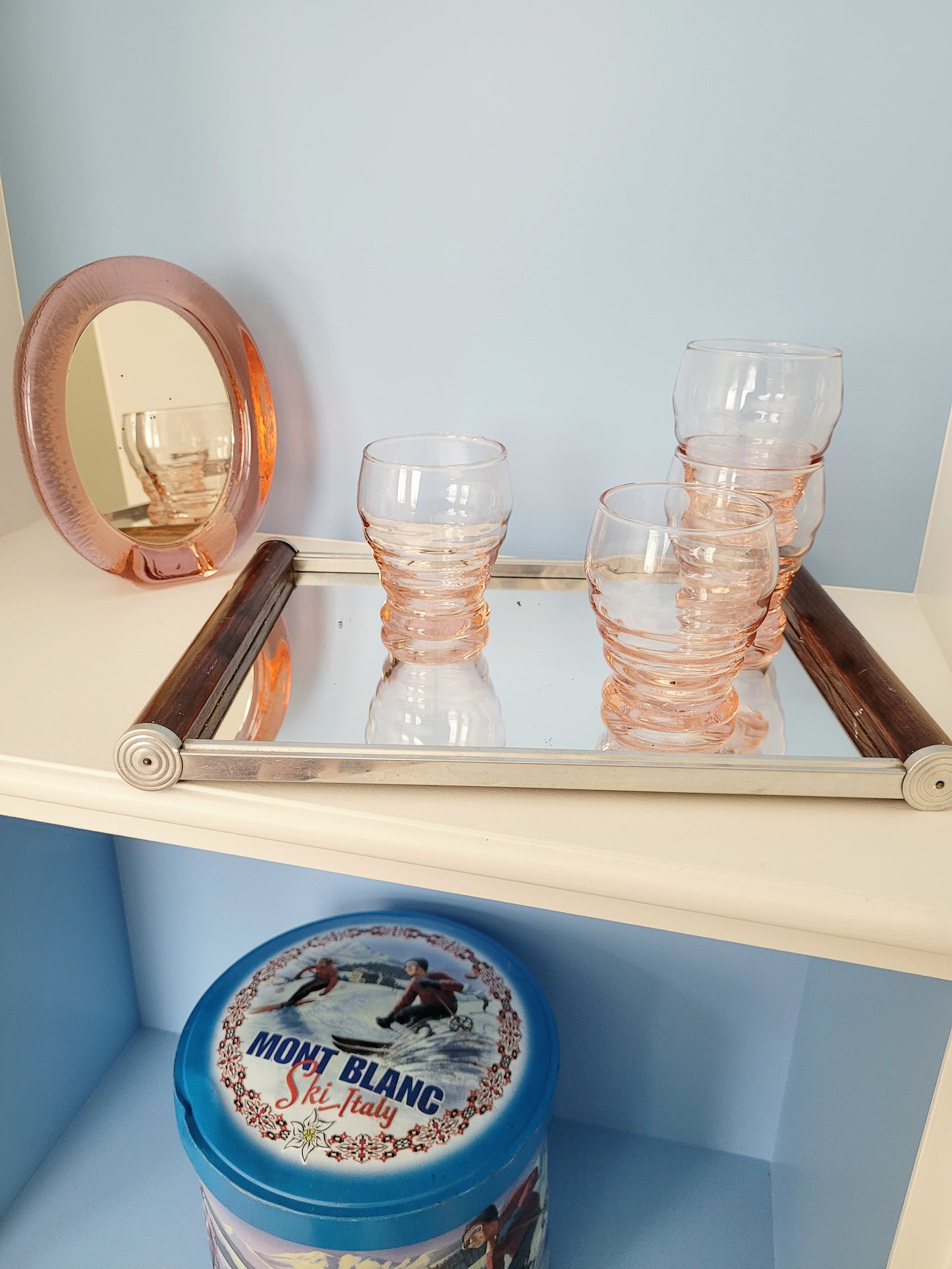 full view of coral art deco drinking glasses 6pc on a mirror tray