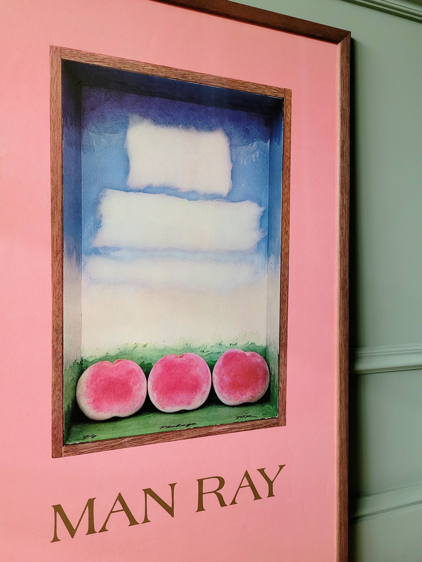 detail of an authentic original exhibition poster from the Man Ray exhibition at the Alexandre Iolas Gallery, depicting his "Three peaches"-work
