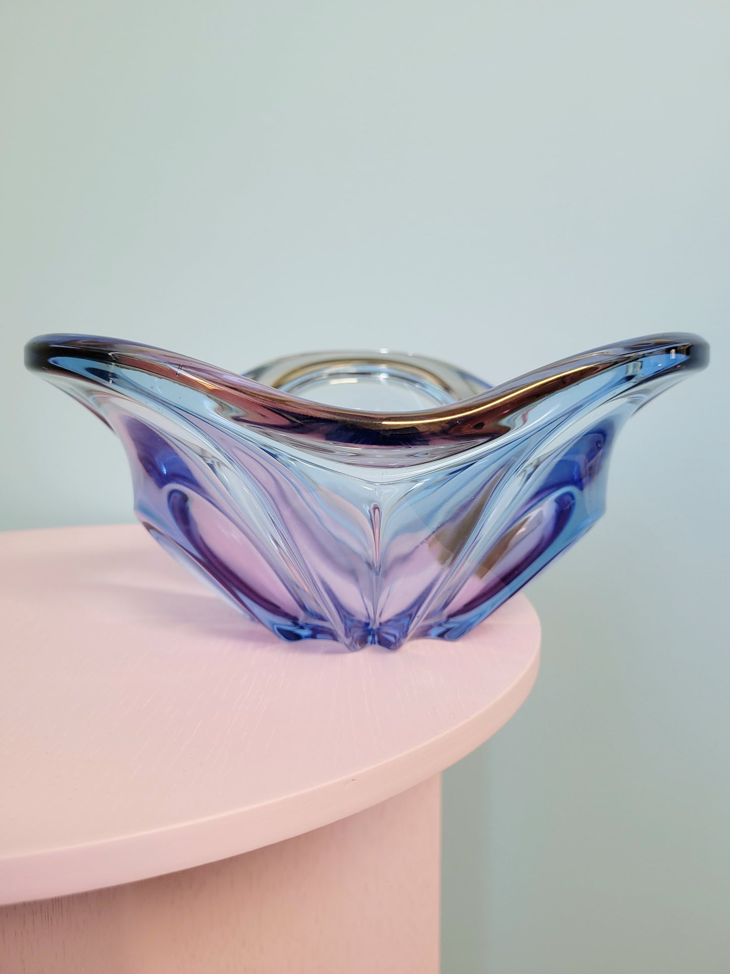 full view of a unique blue and pink glass bowl