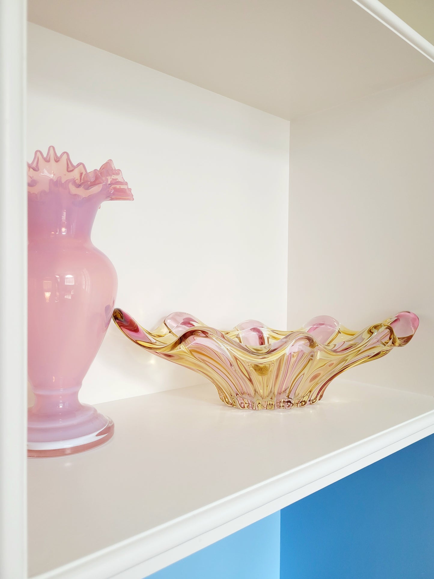 full view of a vibrant candy coloured glass serving or trinket bowl in yellow and pink