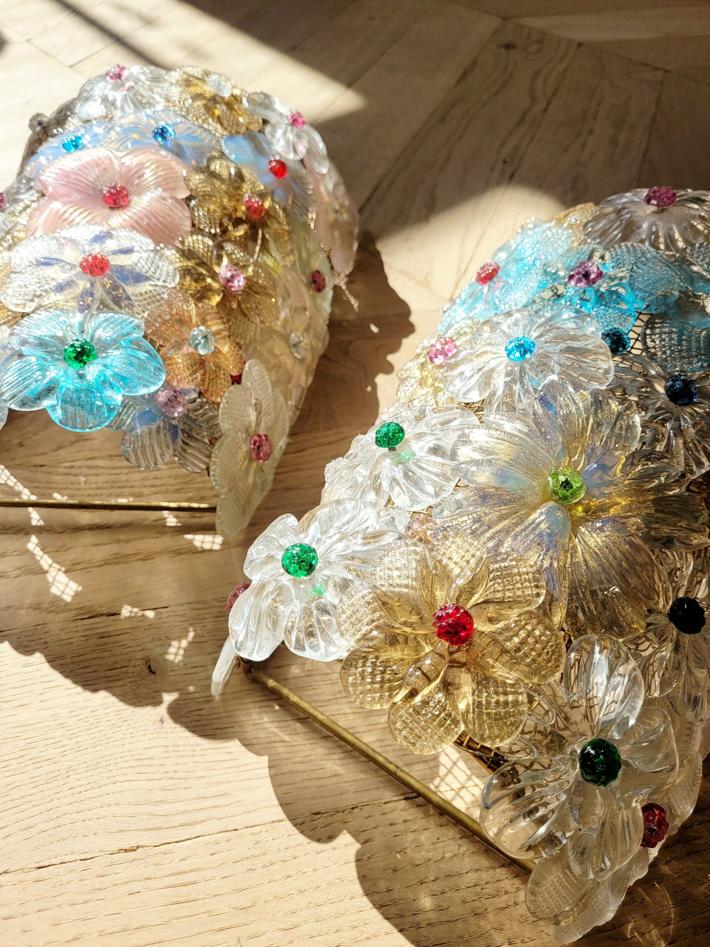 side view of two Seguso vintage Murano flower wall lamps or sconces with colourful glass petals