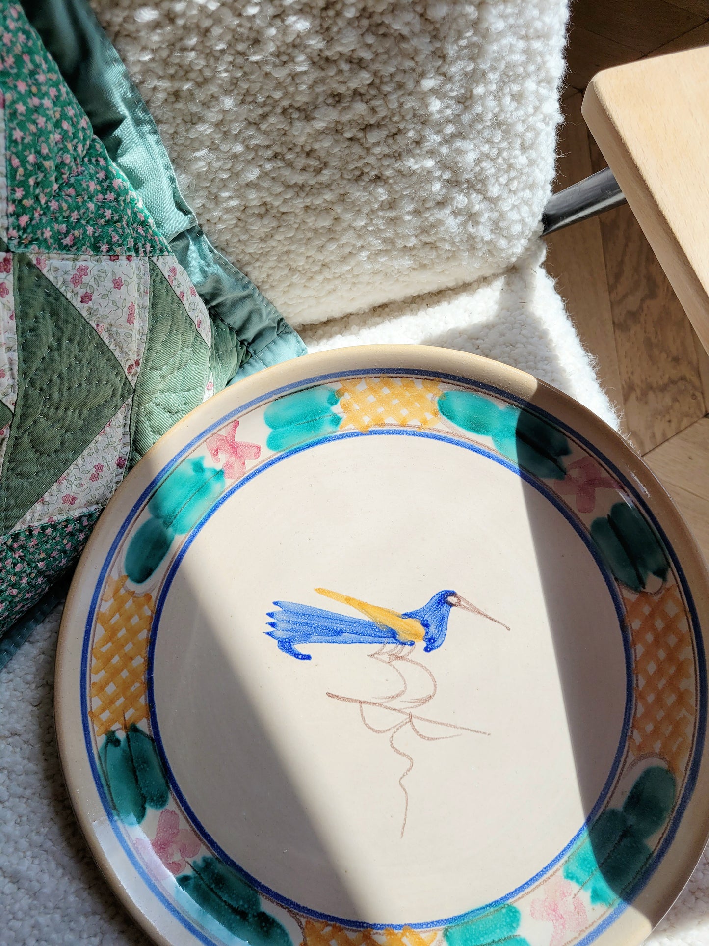 detail of a ceramic (wall) plate from Tuscany with a bird