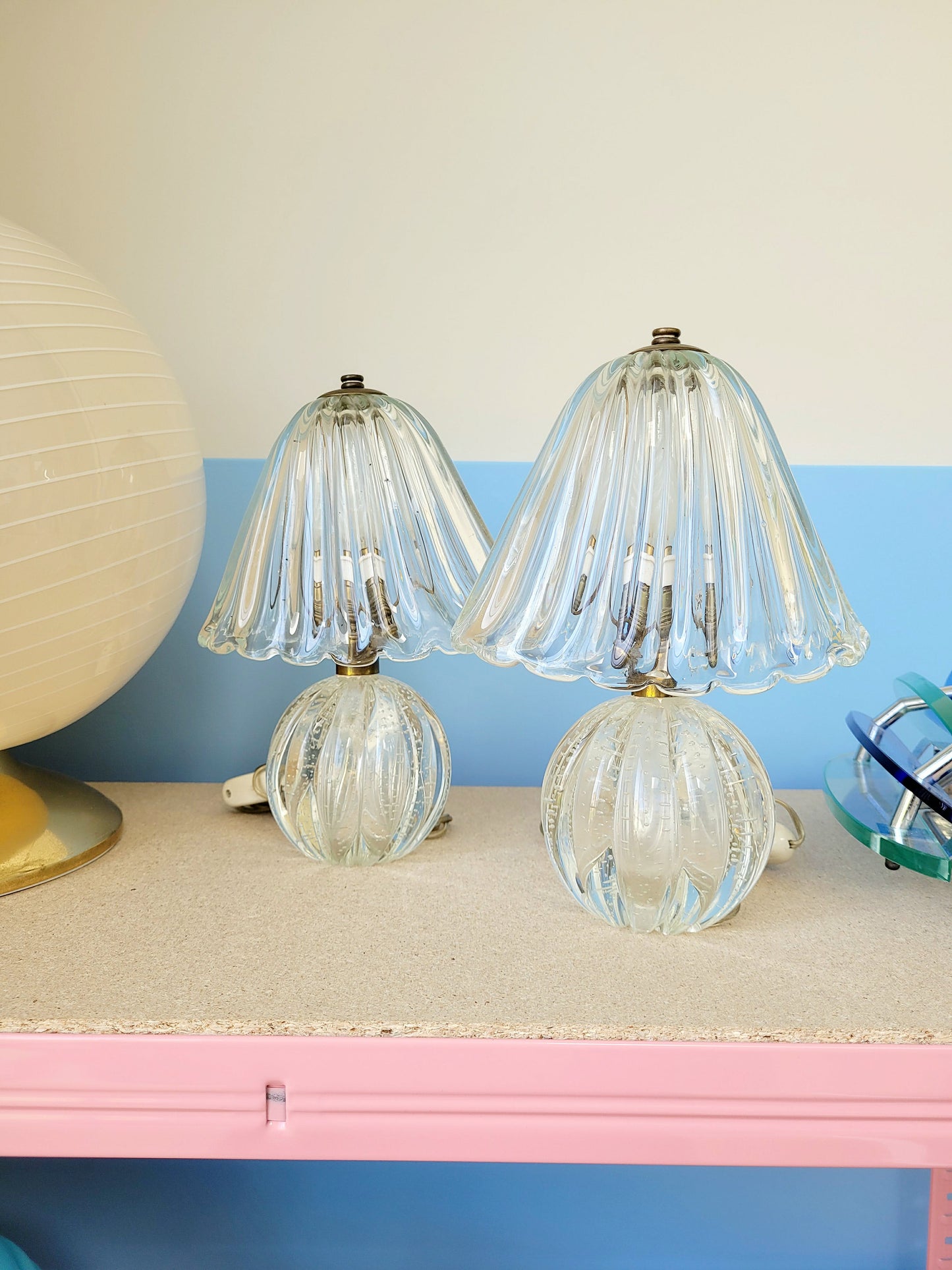 front view of a pair of vintage clear Murano table lamps