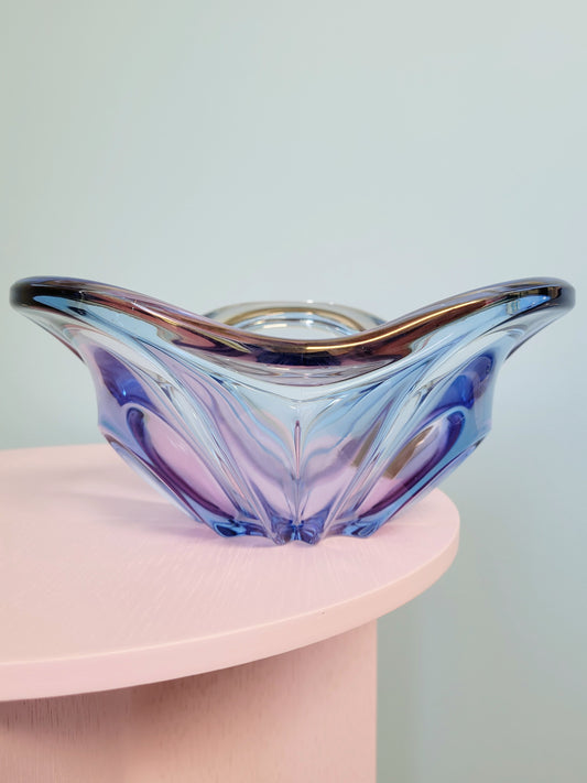 front view of a unique blue and pink glass bowl 