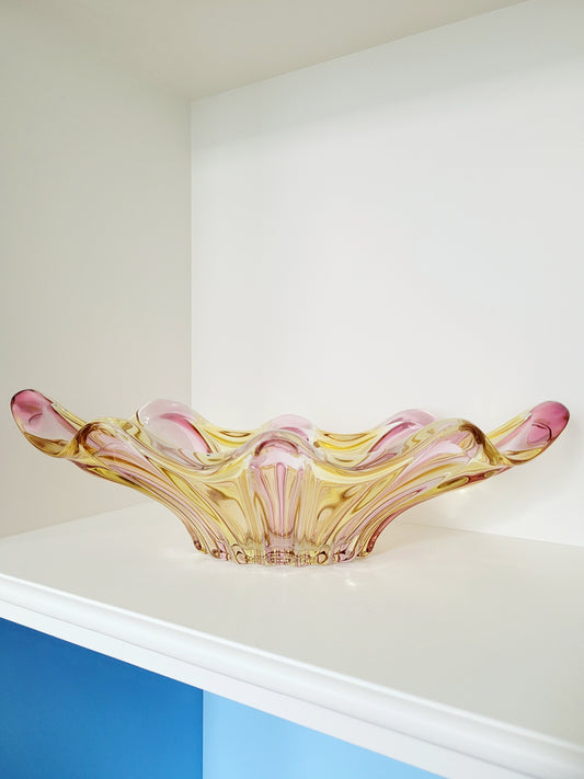 full view of a vibrant candy coloured glass serving or trinket bowl in yellow and pink