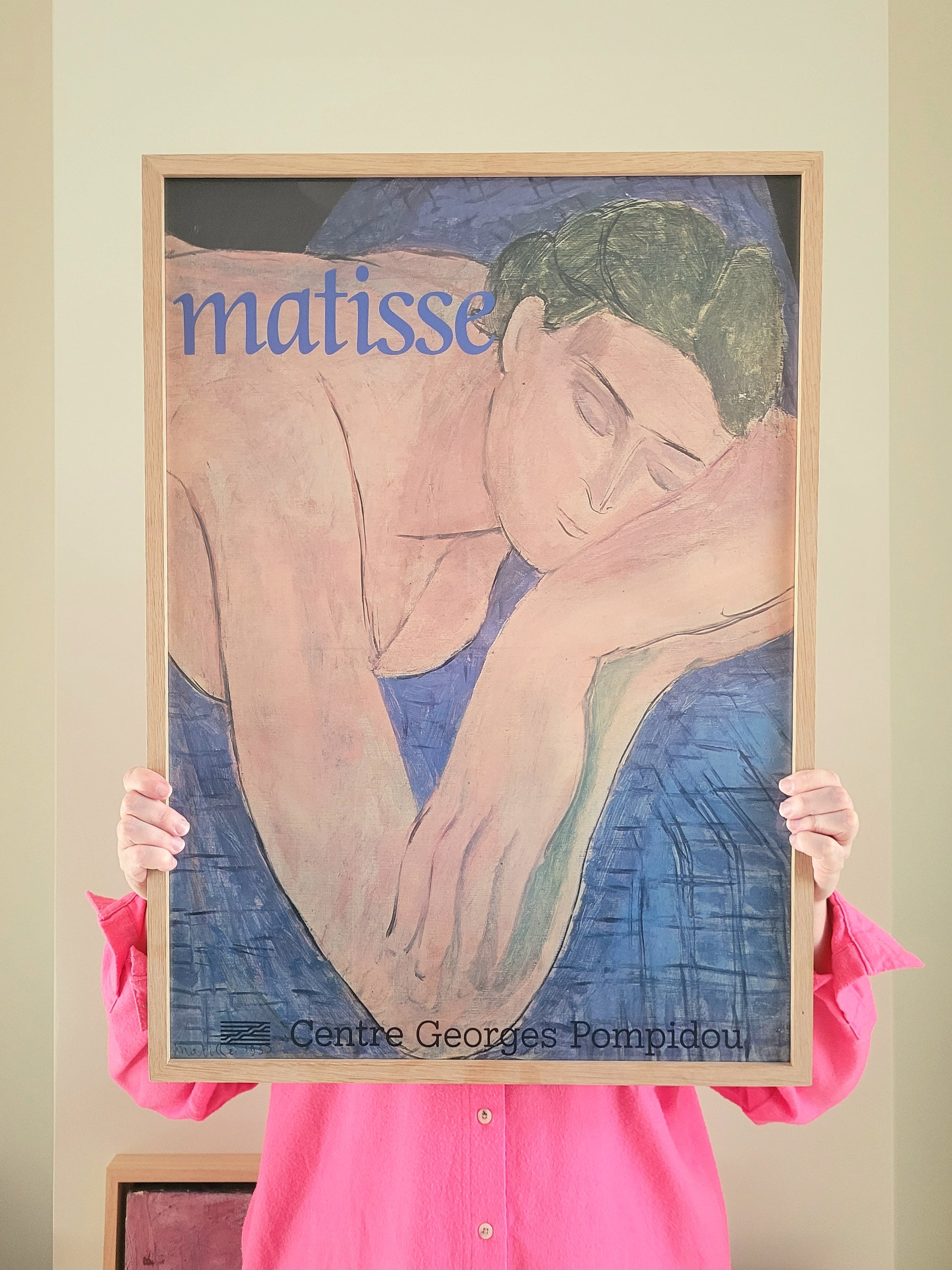 front view of an exhibition poster featuring Henri Matisse's iconic artwork Le Rêve The Dream