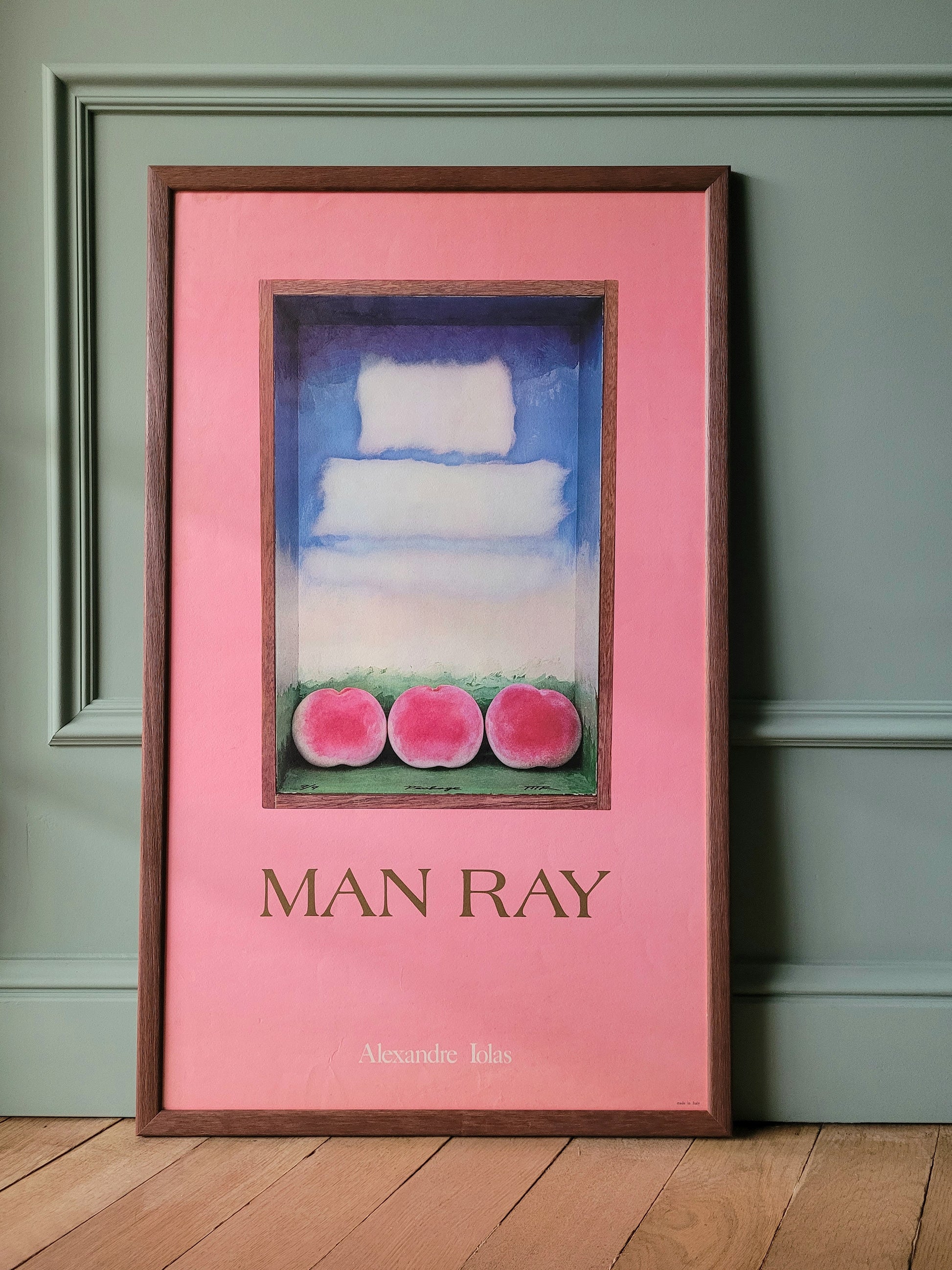 full view of an authentic original exhibition poster from the Man Ray exhibition at the Alexandre Iolas Gallery, depicting his "Three peaches"-work