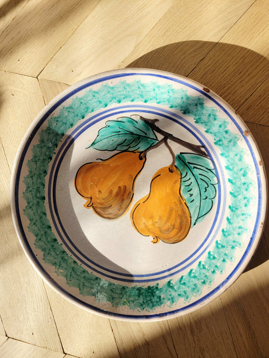 top view of a vintage sicilian ceramic wall plate made in Caltagirone region