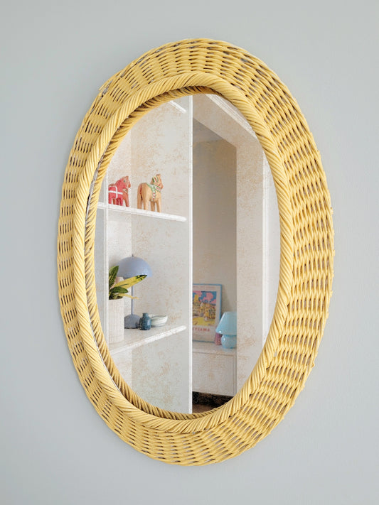 vibrant yellow oval mirror