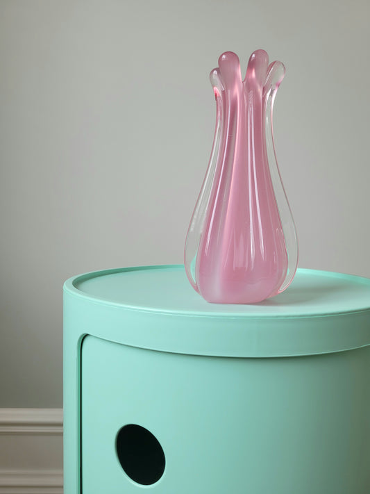 full view of a unique vintage Murano pink hue alabaster vase on a mint green side table
