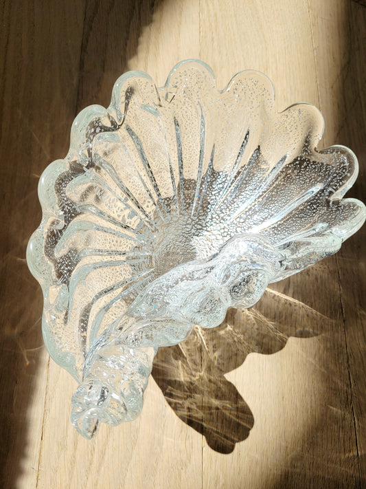top view of a vintage clear and silver Murano bowl in shell shape 