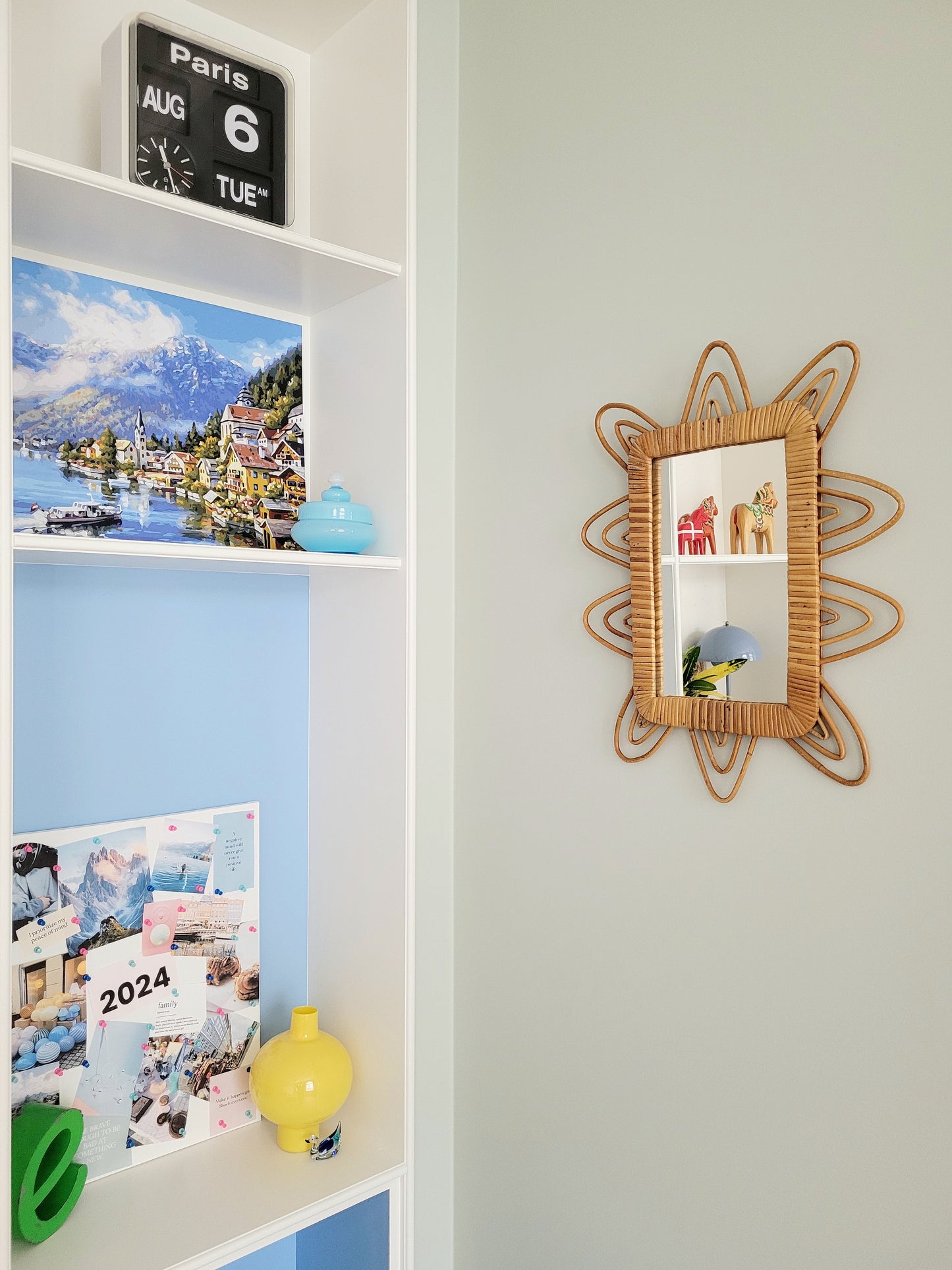 side view of a playful vintage wall mirror with rattan frame