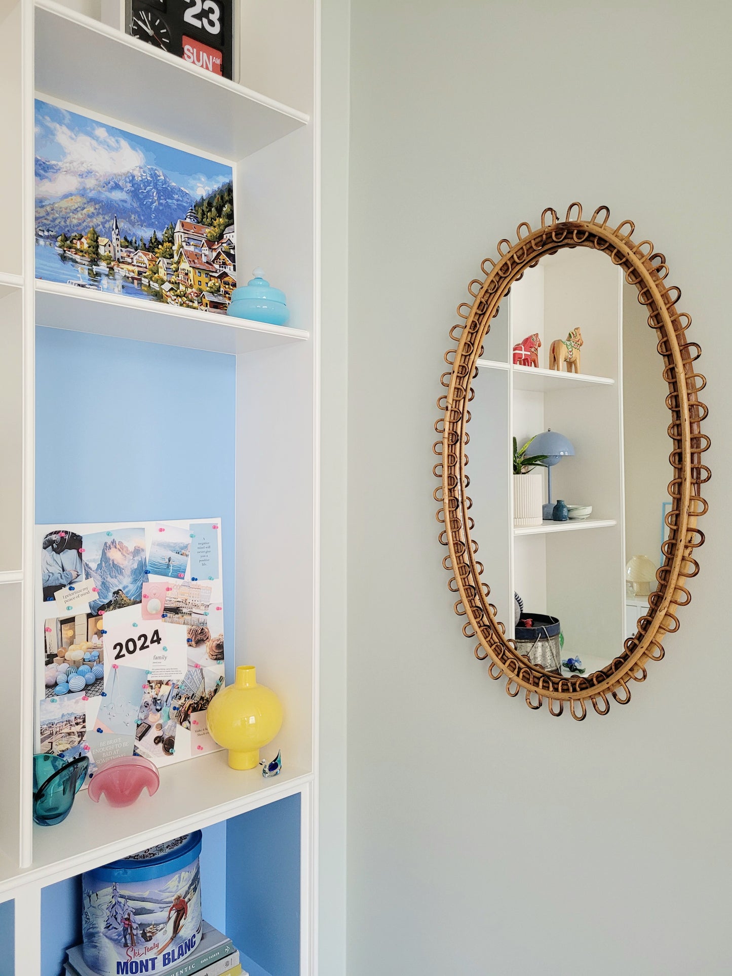 front view of a large vintage oval bamboo loop mirror from Franco Albini