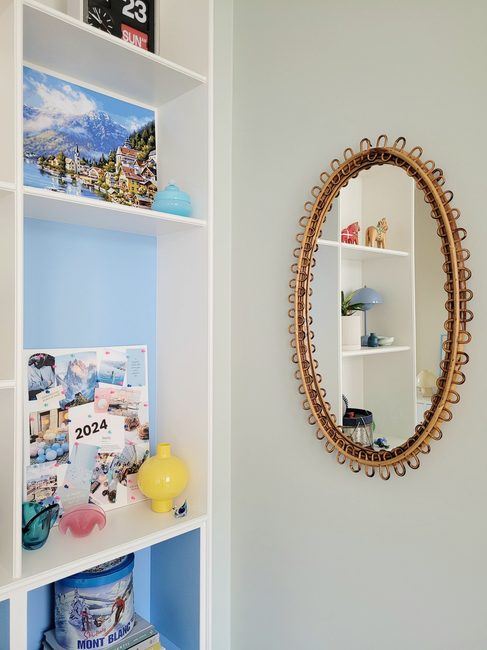 front view of a large vintage oval bamboo loop mirror from Franco Albini