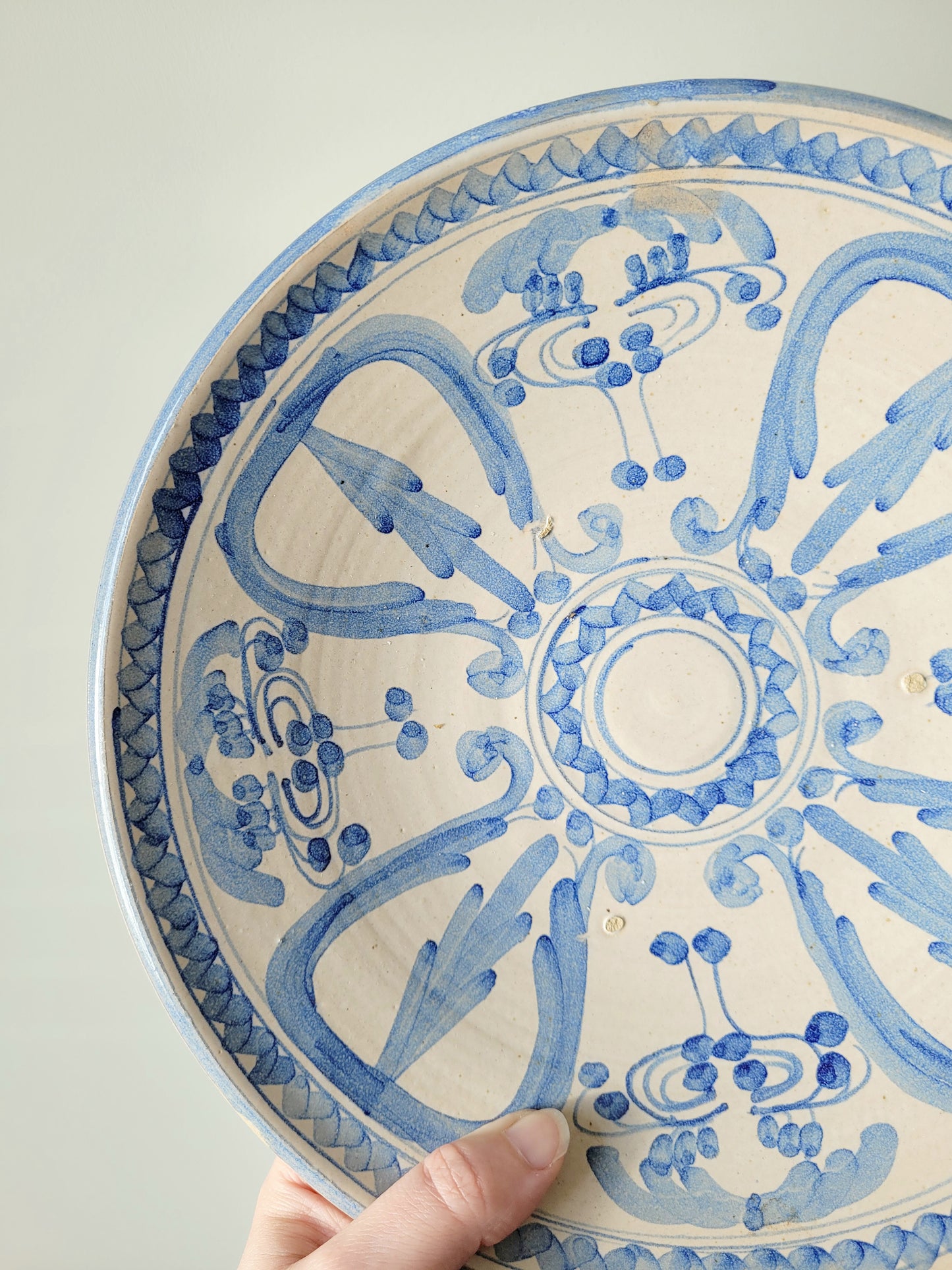detail of a spanish ceramic wall plate from Valencia in cobalt blue
