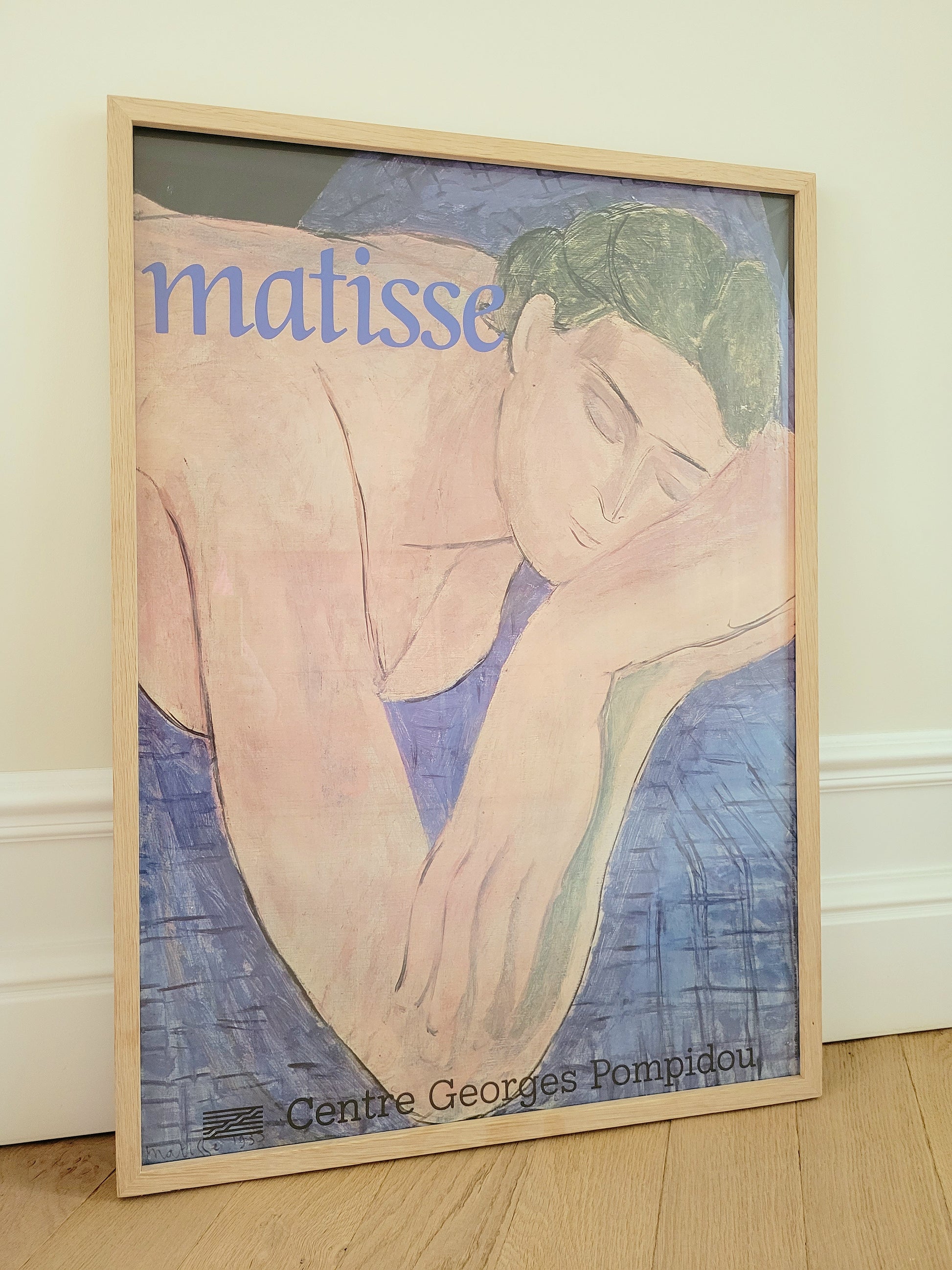 full view of an exhibition poster featuring Henri Matisse's iconic artwork Le Rêve The Dream
