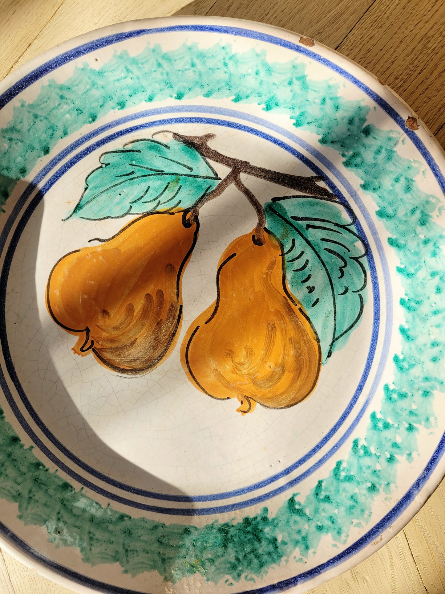 detail of a vintage sicilian ceramic wall plate made in Caltagirone region