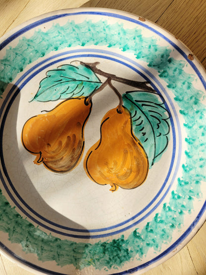 detail of a vintage sicilian ceramic wall plate made in Caltagirone region