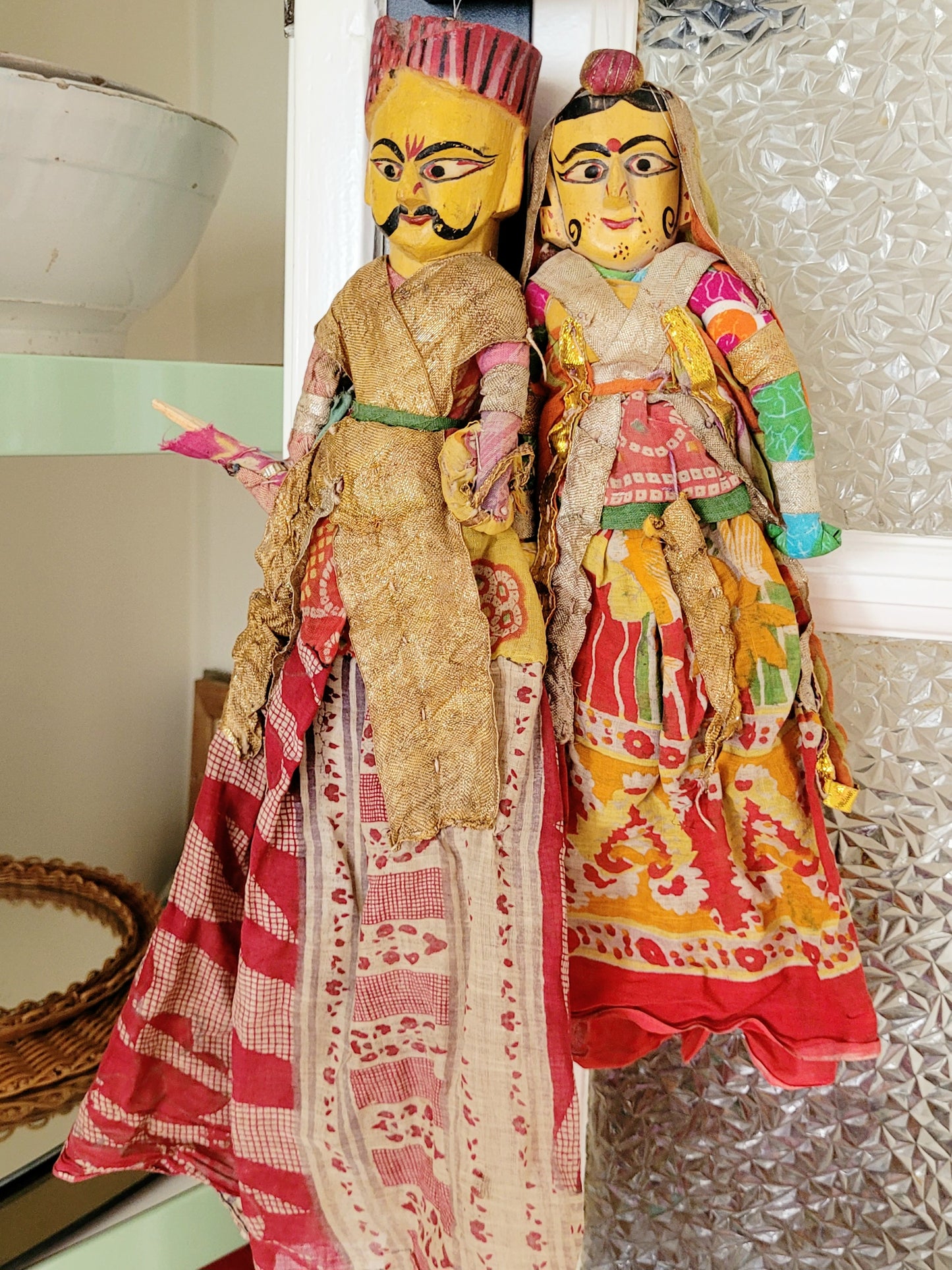 two vintage Asian textile puppet dolls in vibrant colours