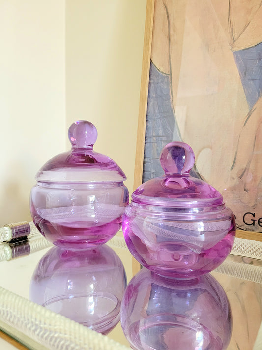 two vintage clear purple Murano bonbonnieres on a Murano mirror tray