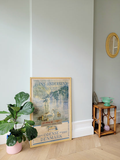 full view of a yellow framed authentic original vintage travel poster for the Hans Christian Andersen's House in Odense Denmark 