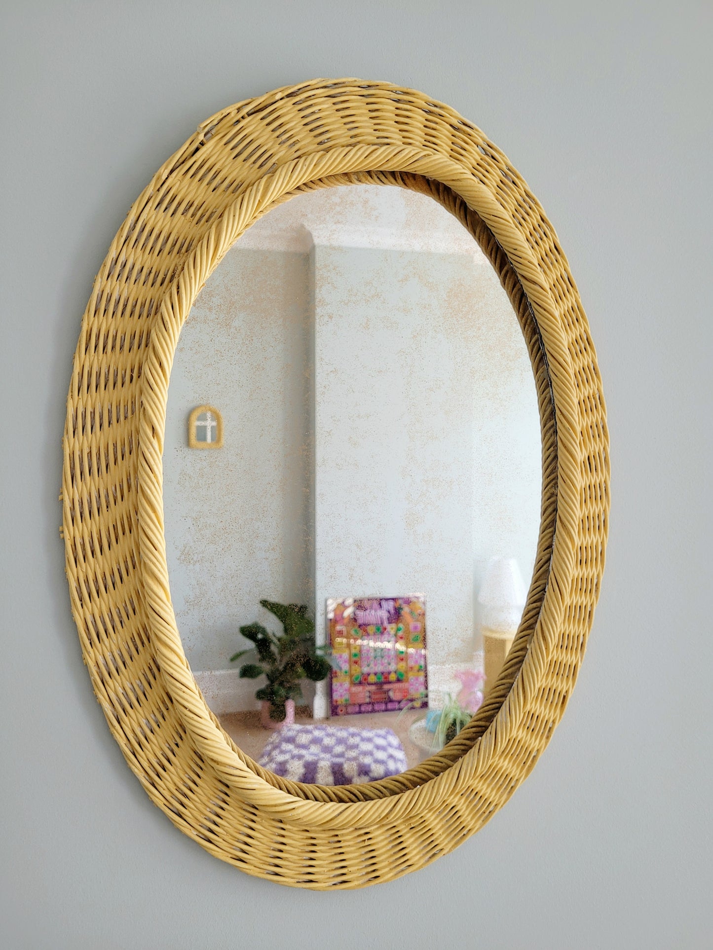vibrant yellow oval mirror