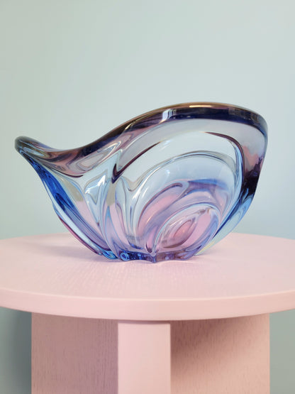 side view of a unique blue and pink glass bowl 