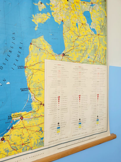 detail of a large historic school map of the Nordic countries hanging on a blue and yellow wall