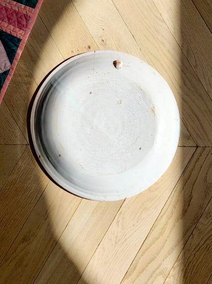 bottom view of a vintage sicilian ceramic wall plate made in Caltagirone region