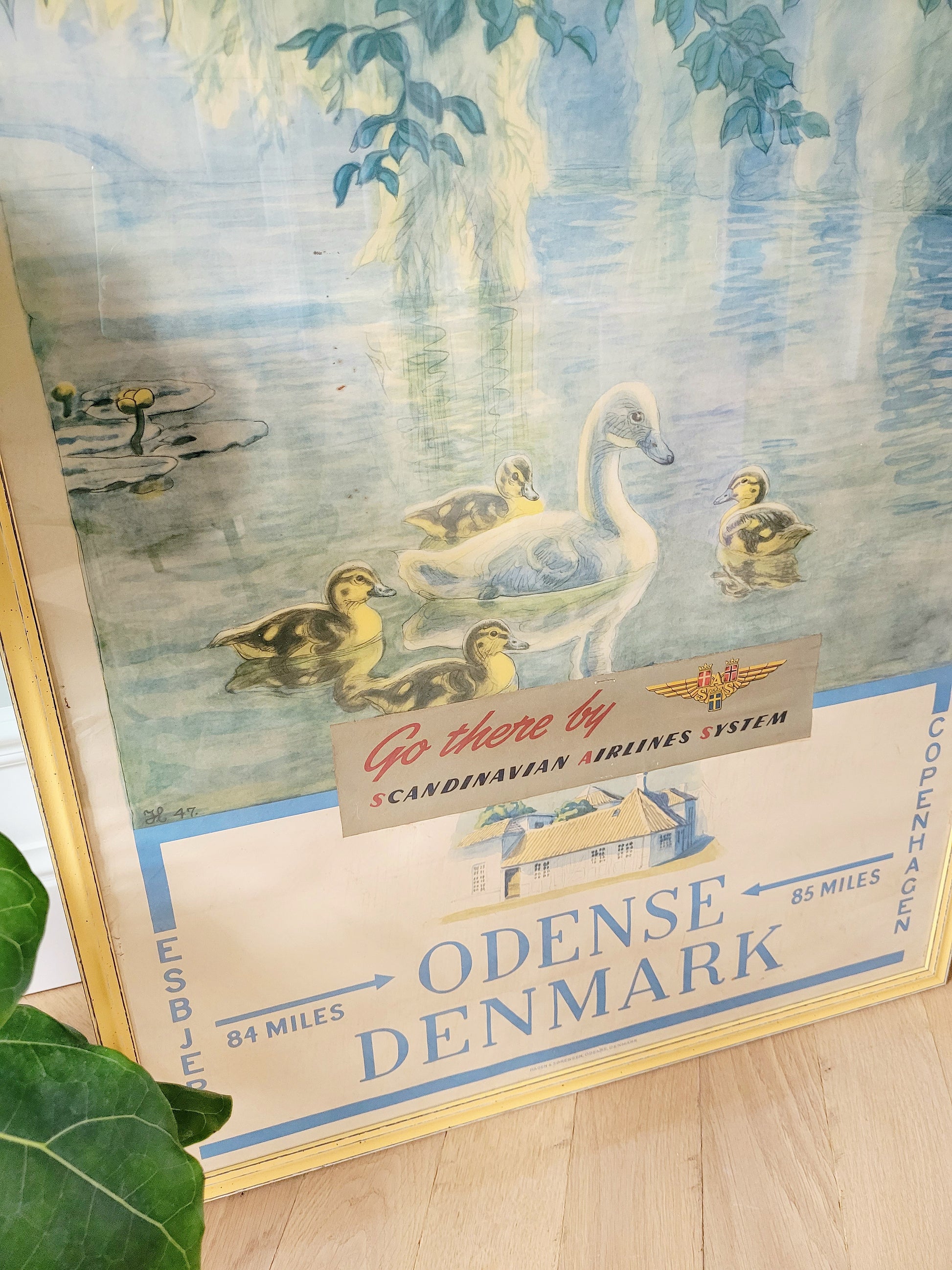 detail of a yellow framed authentic original vintage travel poster for the Hans Christian Andersen's House in Odense Denmark 