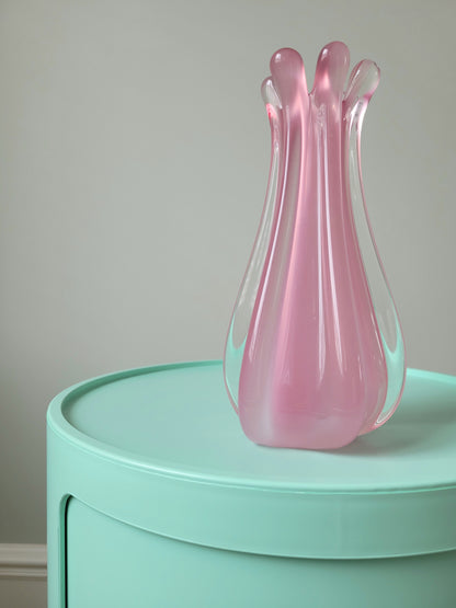 full view of a unique vintage Murano pink hue alabaster vase on a mint green side table