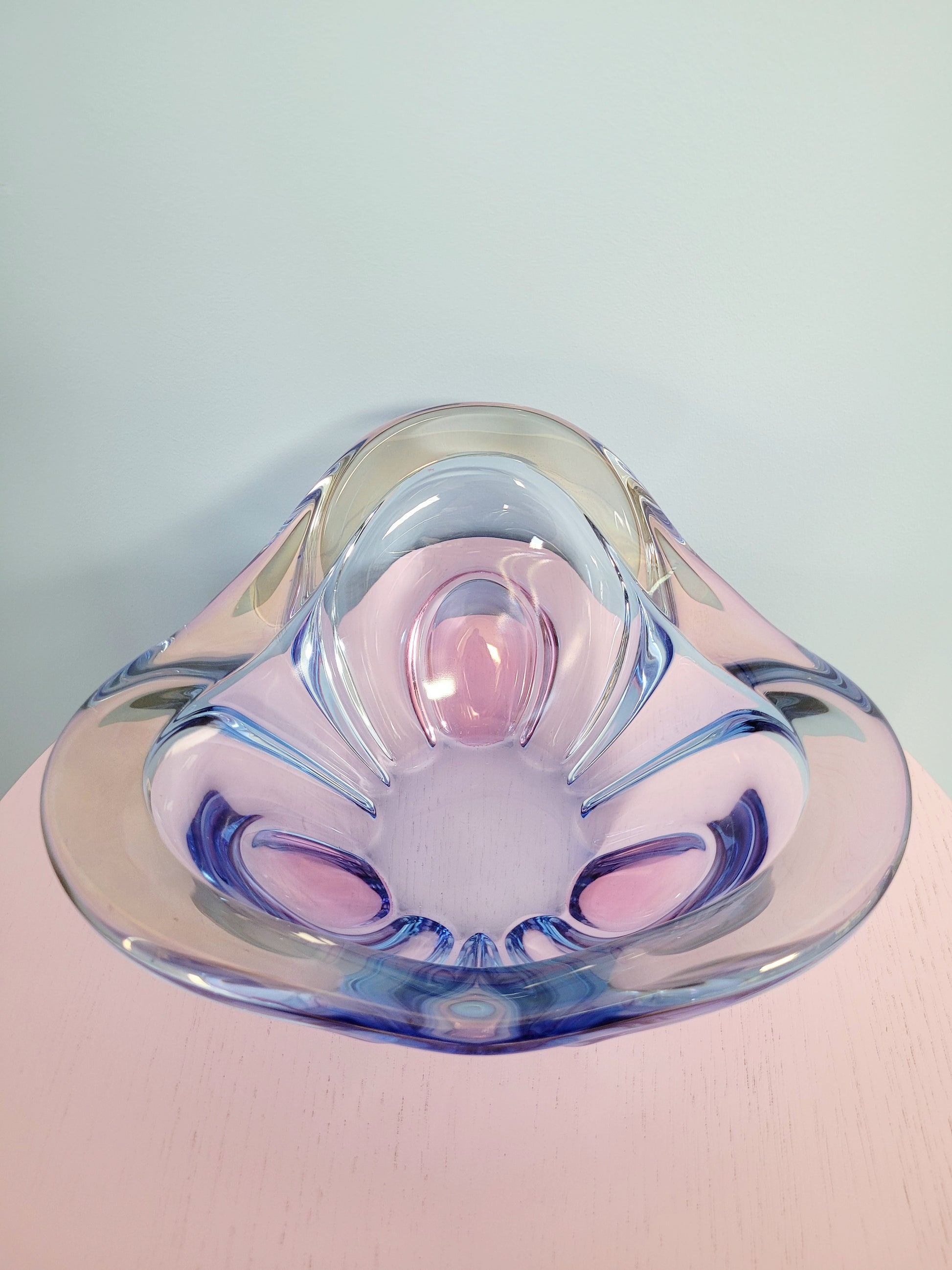 top view of a unique blue and pink glass bowl 