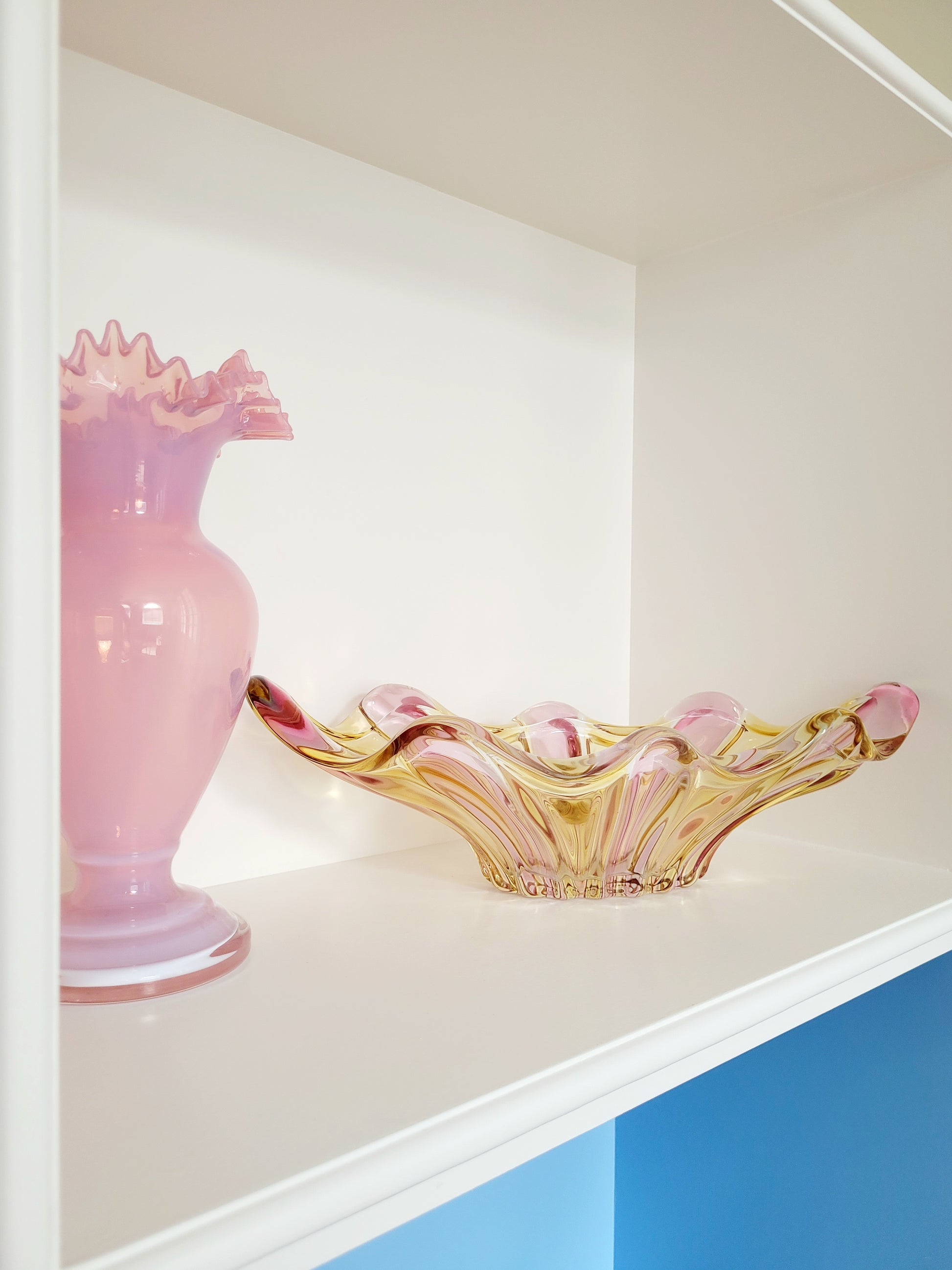 full view of a vibrant candy coloured glass serving or trinket bowl in yellow and pink