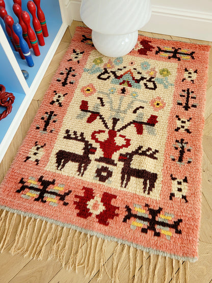 detail of a vintage colourful Scandinavian Rya rug made from wool