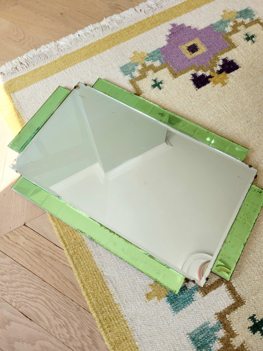 top view of an Art Deco green glass wall mirror