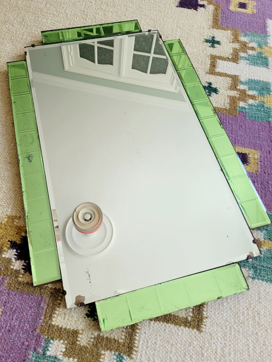top view of an Art Deco green glass wall mirror