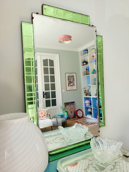 side view of an Art Deco green glass wall mirror