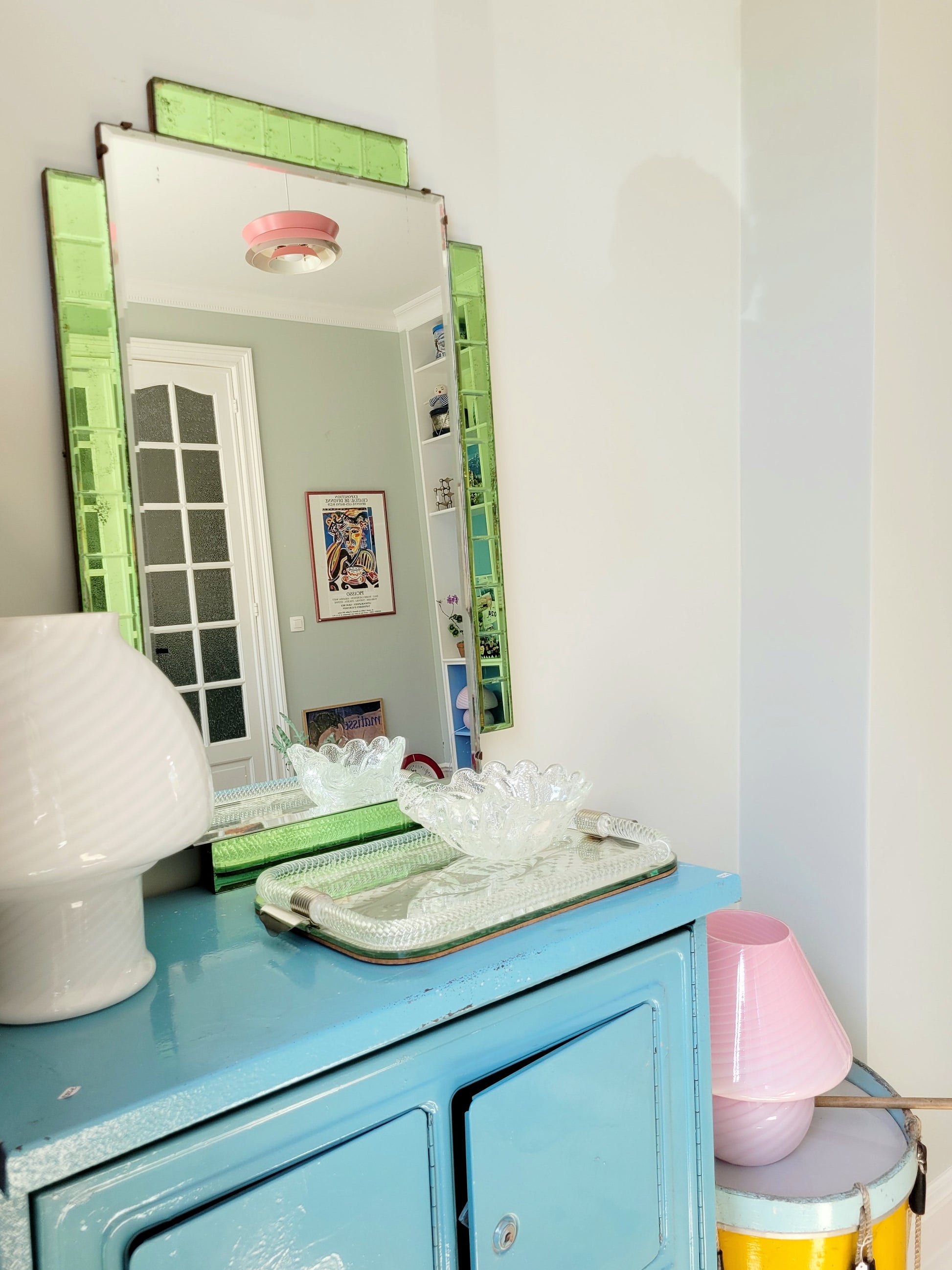 full view of an Art Deco green glass wall mirror