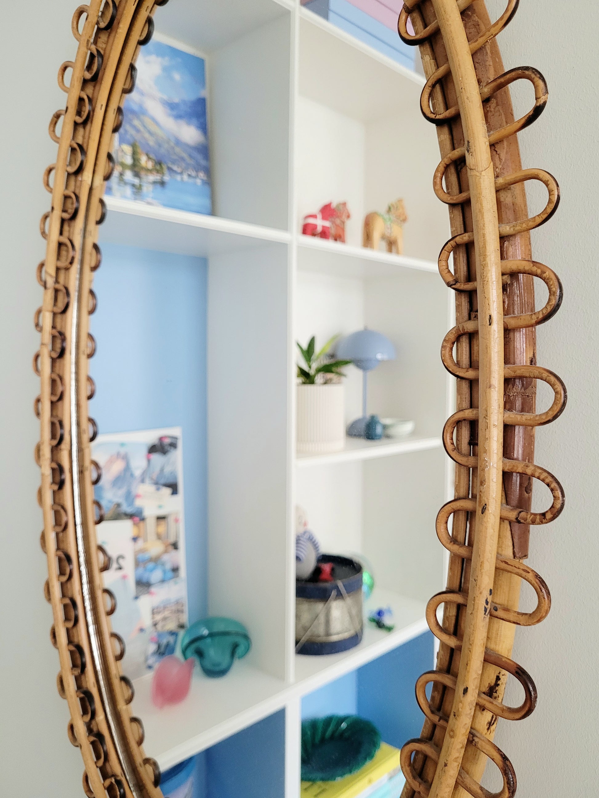 detail of a large vintage oval bamboo loop mirror from Franco Albini