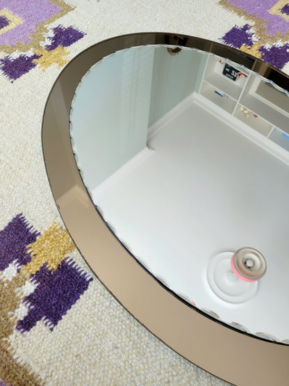 top view of an Italian faceted mirror, featuring a rich brown frame