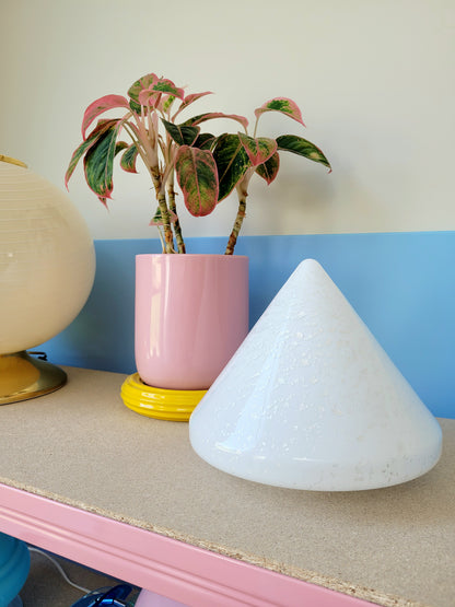 A cone-shaped table lamp made from Murano glass with silver flakes running through it