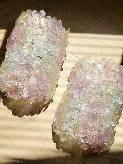 top view of a pair of vintage Murano glass flower wall lights with pink, clear and golden petals