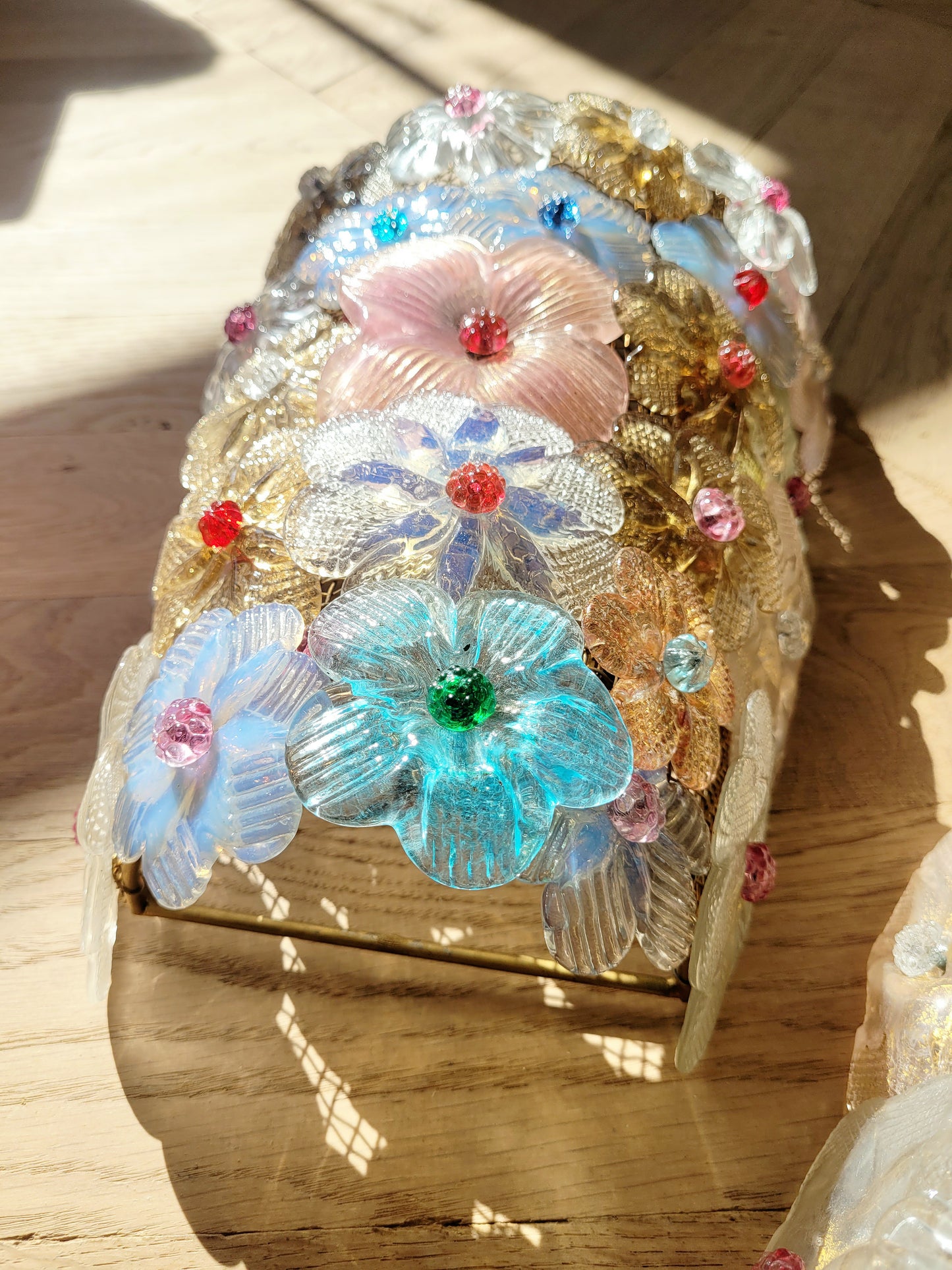 side view of a Seguso vintage Murano flower wall lamp or sconce with colourful glass petals