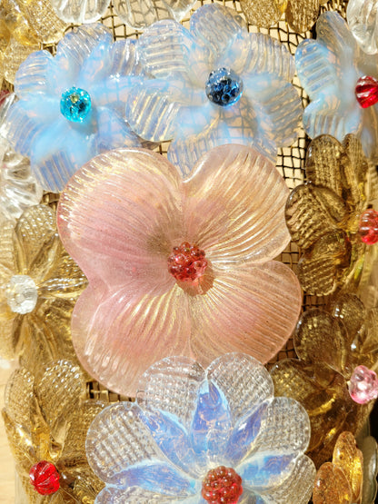 detail of a Seguso vintage Murano flower wall lamp or sconce with colourful glass petals