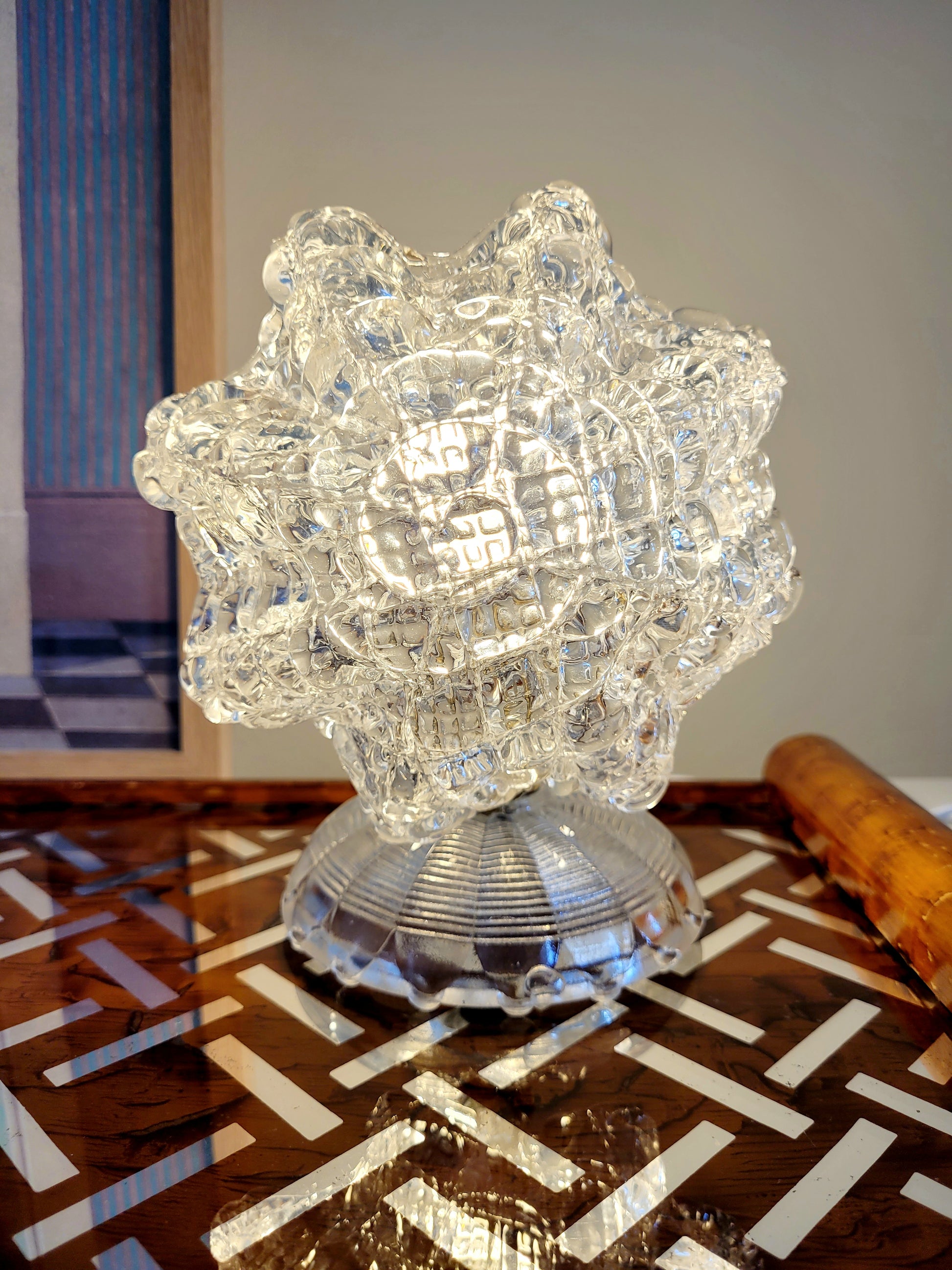 a vintage Murano glass table lamp with starburst shape